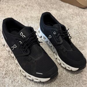 Women’s On Clouds Black and White Sneakers